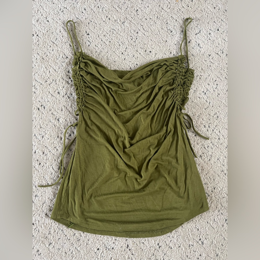 New size small Free People tank in beautiful moss color with side tie detailing.